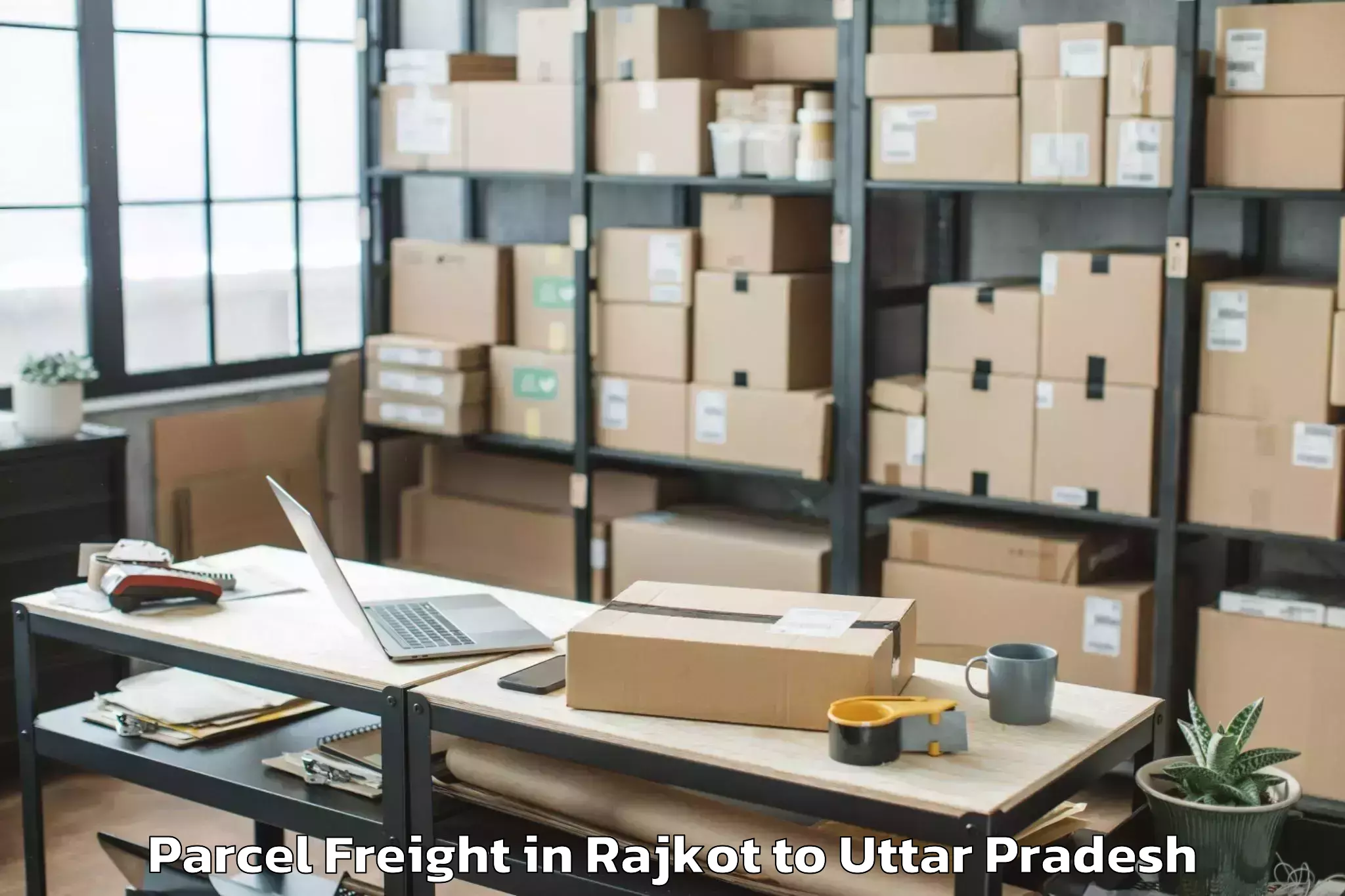 Book Rajkot to Lalganj Raebareli Parcel Freight Online